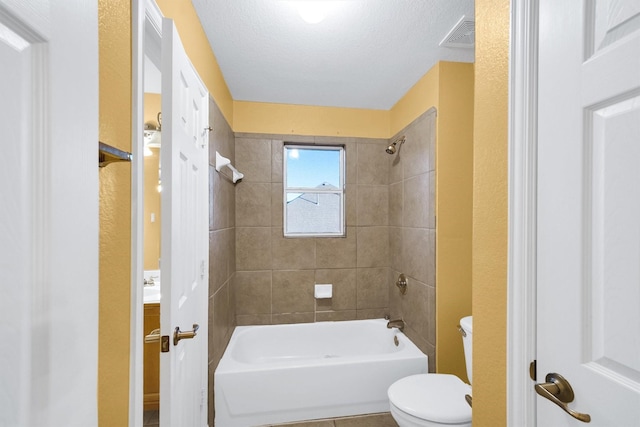 full bathroom with toilet and shower / washtub combination
