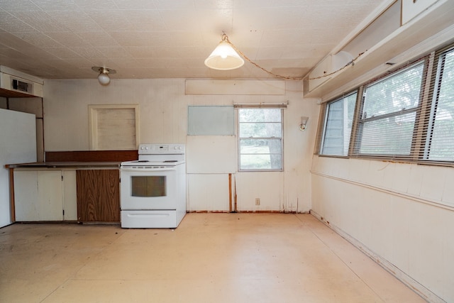 kitchen with white range with electric stovetop and visible vents