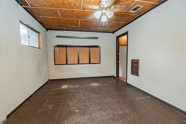 empty room featuring a ceiling fan and visible vents