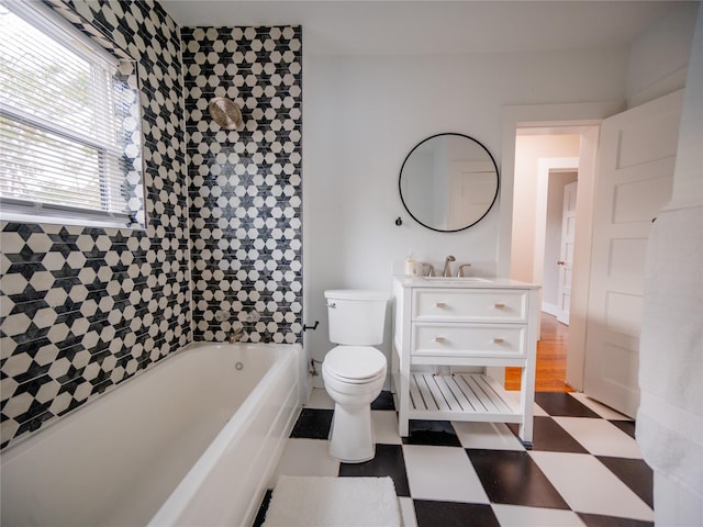 full bath with tile patterned floors, vanity, and toilet