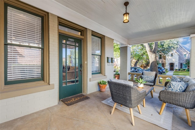 view of patio featuring covered porch and an outdoor hangout area