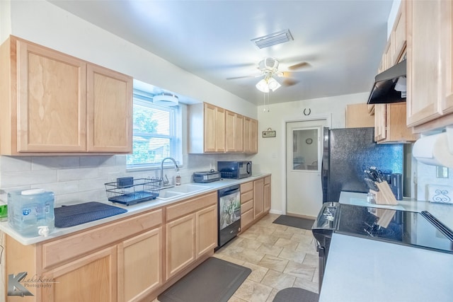 5631 Southmoor Dr, Abilene, TX 79606 - kitchen with visible vents, light brown cabinetry, a sink, black appliances, and under cabinet range hood