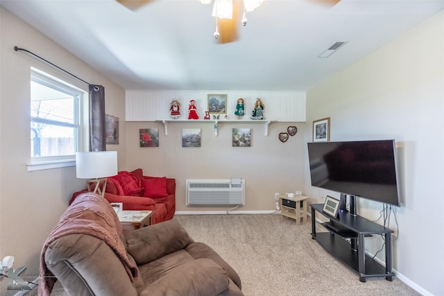 5631 Southmoor Dr, Abilene, TX 79606 - carpeted living room featuring an AC wall unit, baseboards, and visible vents
