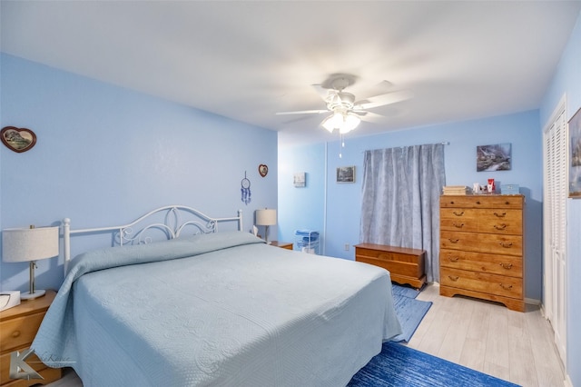 5631 Southmoor Dr, Abilene, TX 79606 - bedroom with a ceiling fan and light wood finished floors