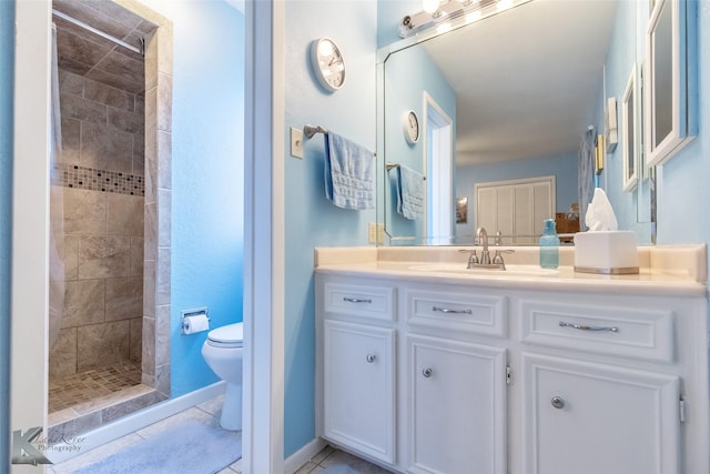 5631 Southmoor Dr, Abilene, TX 79606 - full bathroom with tile patterned flooring, vanity, toilet, baseboards, and a shower stall