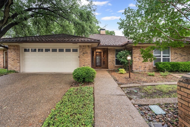 832 Havenwood Ln S, Fort Worth, TX 76112 - ranch-style home with an attached garage, brick siding, driveway, and a chimney