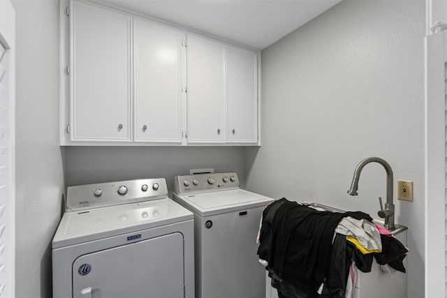 832 Havenwood Ln S, Fort Worth, TX 76112 - washroom featuring washer and clothes dryer and cabinet space