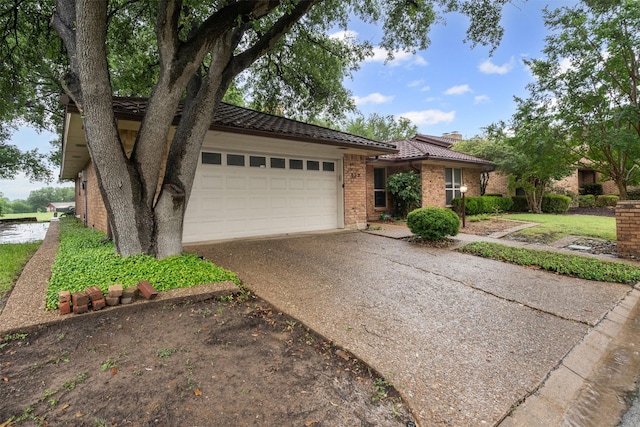 832 Havenwood Ln S, Fort Worth, TX 76112 - ranch-style house with a garage, brick siding, a tile roof, and aphalt driveway