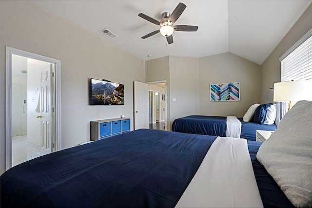 bedroom with ceiling fan, lofted ceiling, connected bathroom, and visible vents