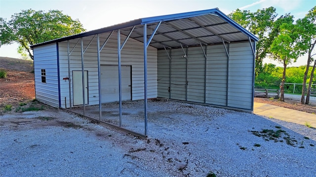 view of outbuilding featuring a carport
