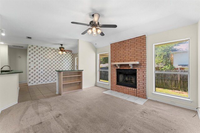 7632 Arbor Ridge Ct, Fort Worth, TX 76112 - unfurnished living room with carpet floors, a ceiling fan, a sink, and healthy amount of natural light