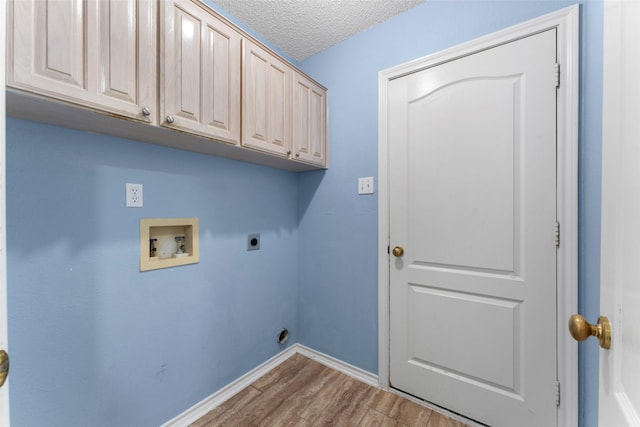7632 Arbor Ridge Ct, Fort Worth, TX 76112 - washroom with electric dryer hookup, cabinet space, washer hookup, wood finished floors, and baseboards