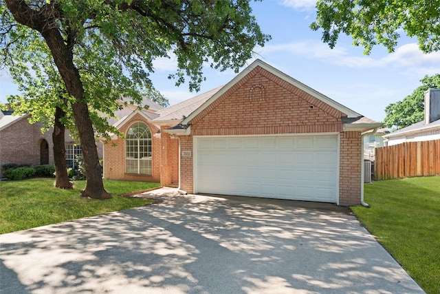 7632 Arbor Ridge Ct, Fort Worth, TX 76112 - view of front of house featuring concrete driveway, brick siding, and an attached garage