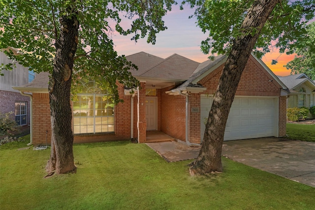 7632 Arbor Ridge Ct, Fort Worth, TX 76112 - single story home featuring concrete driveway, a lawn, an attached garage, and brick siding