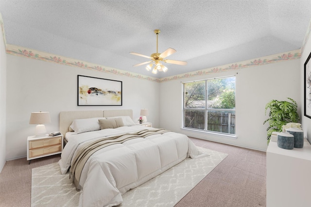 7632 Arbor Ridge Ct, Fort Worth, TX 76112 - bedroom with carpet flooring, a textured ceiling, and a ceiling fan