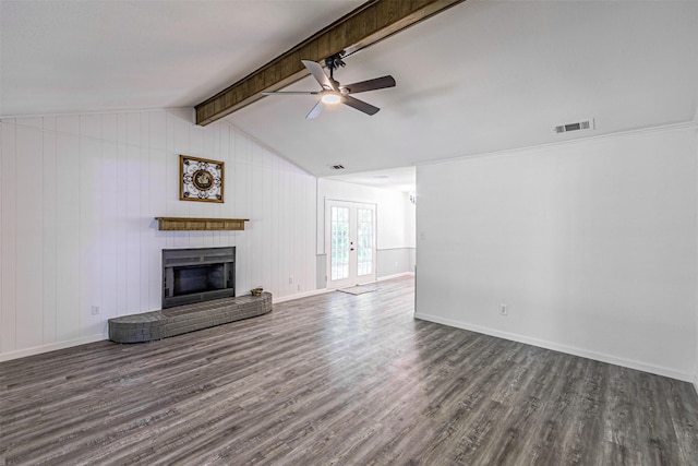 unfurnished living room with visible vents, dark wood-style flooring, vaulted ceiling with beams, french doors, and a ceiling fan