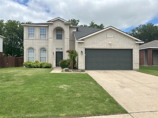 2416 Dogwood Dr, Little Elm, TX 75068 - traditional home with brick siding, a garage, and driveway