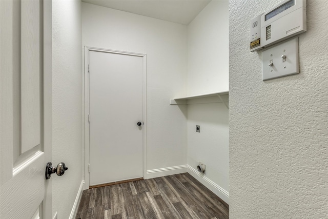 2416 Dogwood Dr, Little Elm, TX 75068 - laundry area featuring dark wood finished floors, hookup for an electric dryer, and baseboards