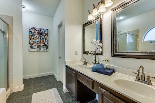 2416 Dogwood Dr, Little Elm, TX 75068 - bathroom featuring a shower stall, double vanity, and baseboards