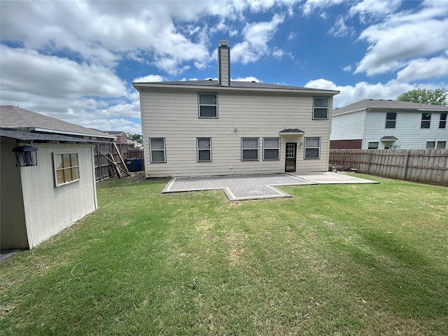 2416 Dogwood Dr, Little Elm, TX 75068 - back of house with a patio area and a chimney