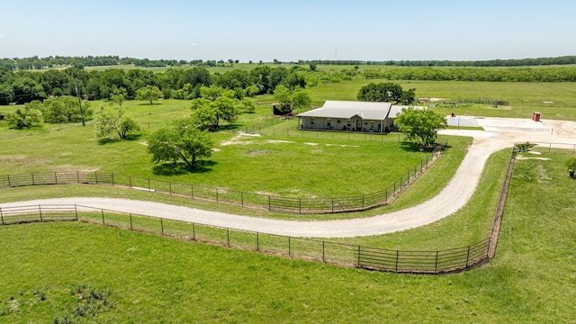 birds eye view of property featuring a rural view