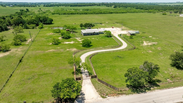 birds eye view of property featuring a rural view