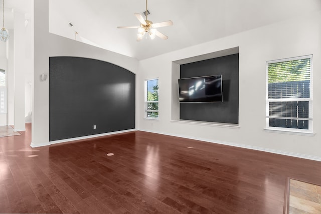 907 Ozark Dr, Allen, TX 75002 - unfurnished living room featuring a ceiling fan, baseboards, plenty of natural light, and wood finished floors