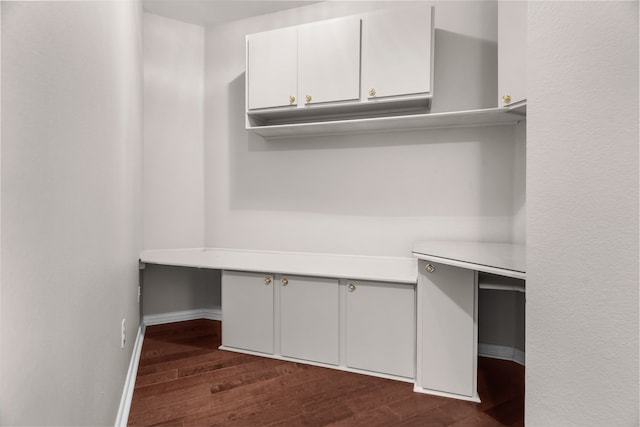 907 Ozark Dr, Allen, TX 75002 - unfurnished office with baseboards and dark wood-type flooring
