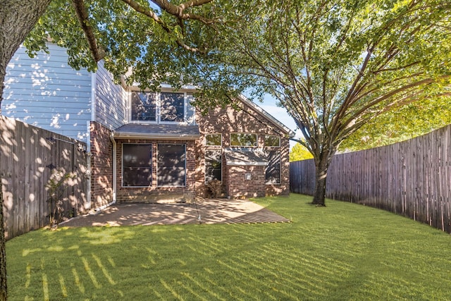 907 Ozark Dr, Allen, TX 75002 - view of yard featuring a fenced backyard and a patio
