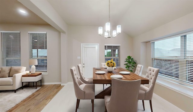 760 Catalpa Rd, Saginaw, TX 76131 - dining room with a chandelier, healthy amount of natural light, light wood-style floors, baseboards, and vaulted ceiling