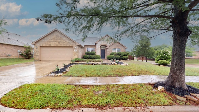 760 Catalpa Rd, Saginaw, TX 76131 - view of front of home with brick siding, an attached garage, a front lawn, and driveway