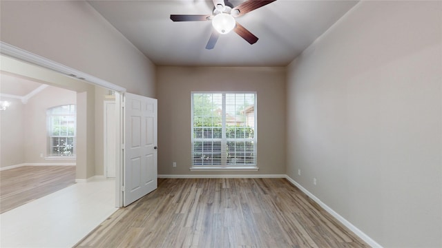 760 Catalpa Rd, Saginaw, TX 76131 - empty room with light wood finished floors, a ceiling fan, and baseboards