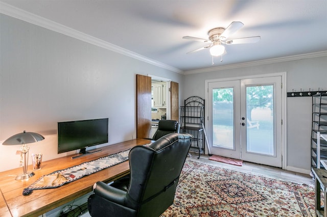 office space with french doors, a ceiling fan, wood finished floors, baseboards, and ornamental molding