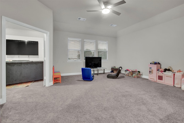 game room featuring visible vents, a ceiling fan, carpet, and baseboards