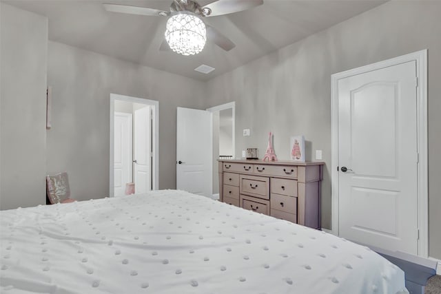 bedroom with ceiling fan and visible vents