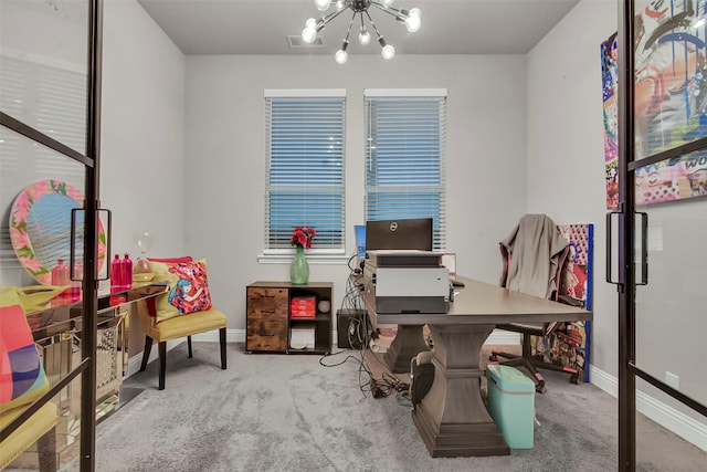 office featuring baseboards, carpet, and a notable chandelier