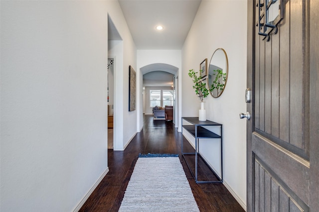 1809 6th St, Argyle, TX 76226 - hallway with arched walkways, wood finished floors, baseboards, and recessed lighting