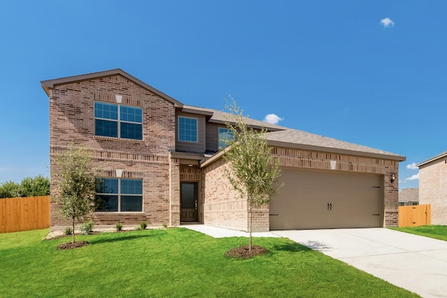 traditional home featuring concrete driveway, brick siding, an attached garage, and fence