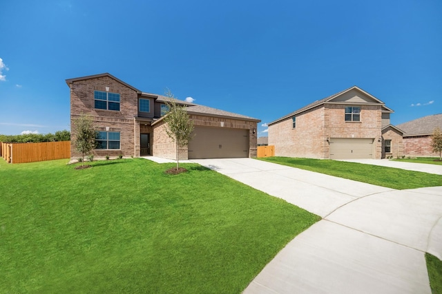view of front of home featuring concrete driveway, brick siding, fence, and a front yard