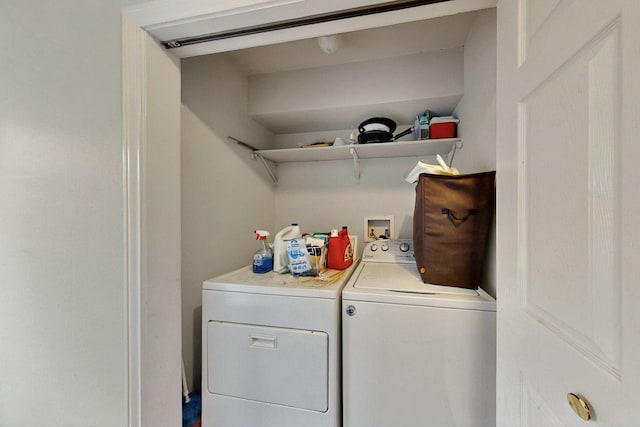 laundry room with independent washer and dryer