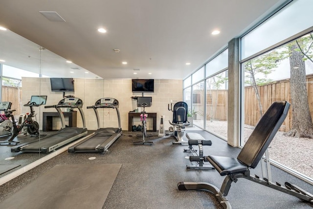 exercise room featuring recessed lighting