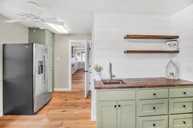 397 Rs County Road 4452, Point, TX 75472 - kitchen with stainless steel refrigerator with ice dispenser, green cabinetry, butcher block counters, a sink, and ceiling fan