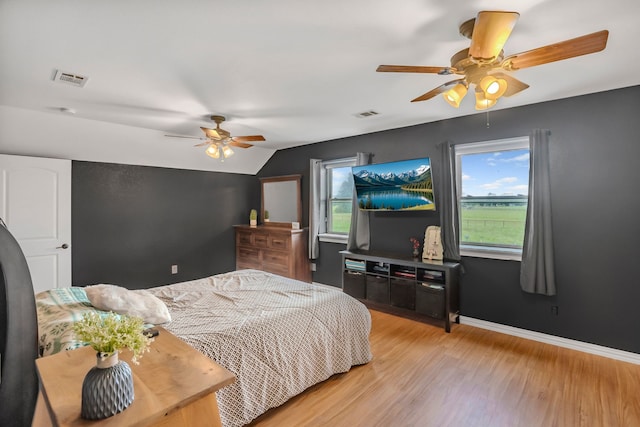 397 Rs County Road 4452, Point, TX 75472 - bedroom featuring light wood-type flooring, baseboards, lofted ceiling, and ceiling fan