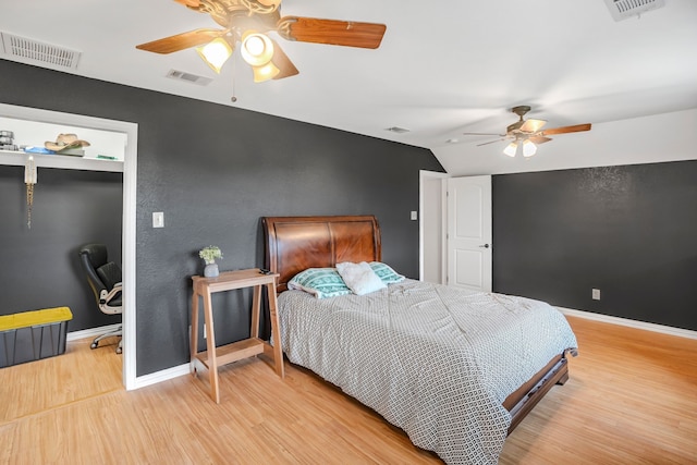 397 Rs County Road 4452, Point, TX 75472 - bedroom with wood finished floors, baseboards, a ceiling fan, and an office area