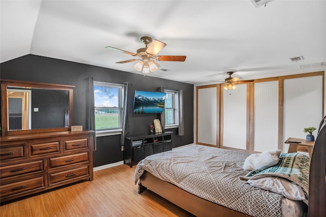 397 Rs County Road 4452, Point, TX 75472 - bedroom featuring light wood-type flooring, vaulted ceiling, baseboards, and a ceiling fan