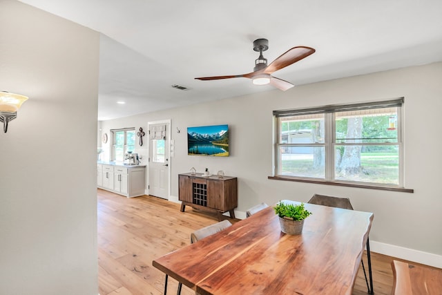 397 Rs County Road 4452, Point, TX 75472 - dining space with a ceiling fan, light wood-type flooring, and baseboards