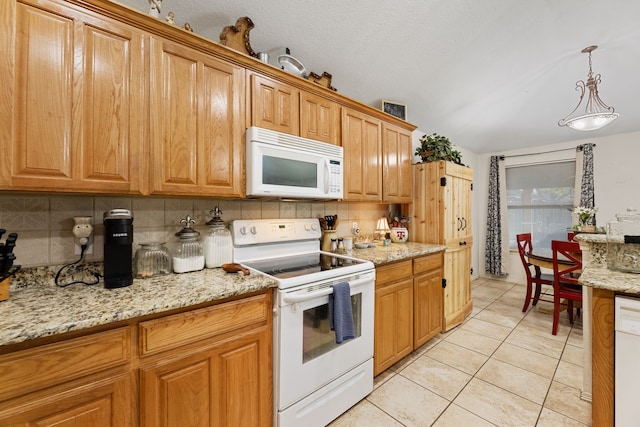 8121 Kathleen Dr, Fort Worth, TX 76137 - kitchen with pendant lighting, white appliances, light stone counters, backsplash, and light tile patterned floors