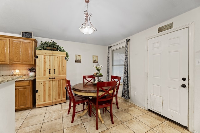 8121 Kathleen Dr, Fort Worth, TX 76137 - dining area with light tile patterned flooring