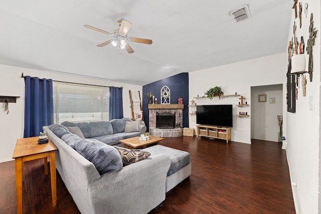 8121 Kathleen Dr, Fort Worth, TX 76137 - living room featuring wood finished floors, a brick fireplace, visible vents, ceiling fan, and lofted ceiling