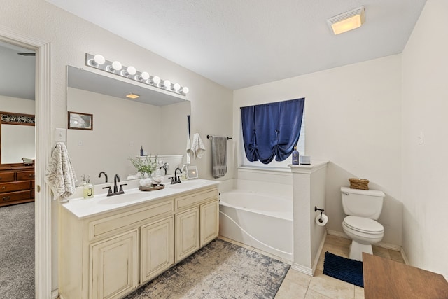 8121 Kathleen Dr, Fort Worth, TX 76137 - bathroom with a sink, double vanity, toilet, and a bath